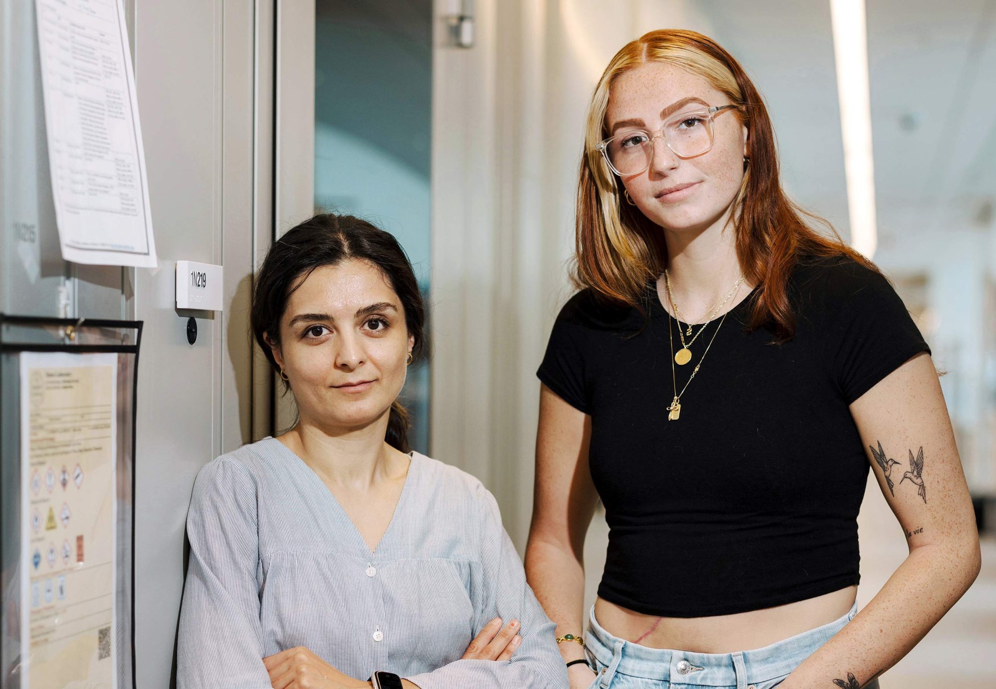 Mahsa Shirani (left), a postdoc, with Skye Ryan, a fibrolamellar hepatocellular carcinoma (FLC) patient who joined the Simon lab in 2024 and is currently working on a project utilizing CRISPR-Cas9 to search for mechanisms that allow FLC to develop unchecked.