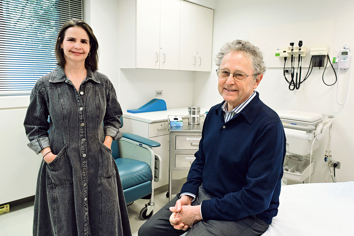 Marina Caskey and Michel Nussenzweig in a medical office.